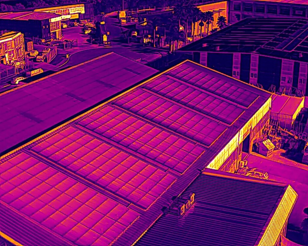 Drone thermal image of a commercial rooftop solar array captured by Eco Shine Solar