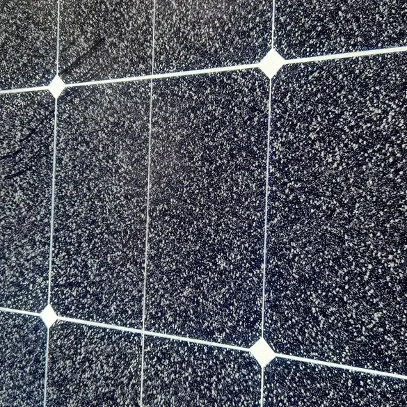 Solar panels in Hillcrest, Hamilton before cleaning: fine, even dust film across the glass