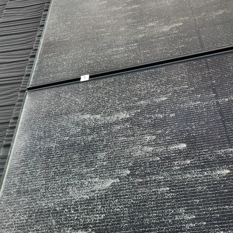 Solar panels in Pyes Pa before cleaning: fine dust and grime across the glass