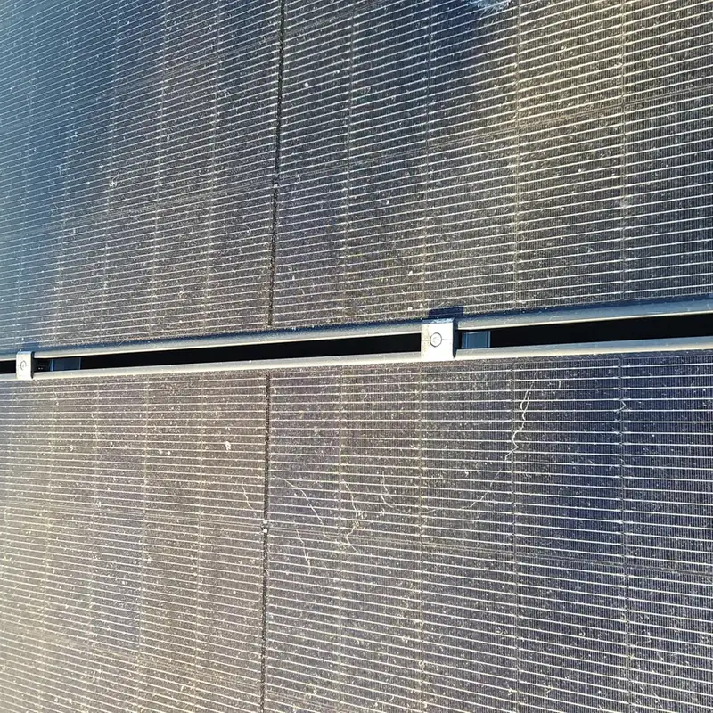 Solar panels in Poukawa before cleaning: dust film across the glass