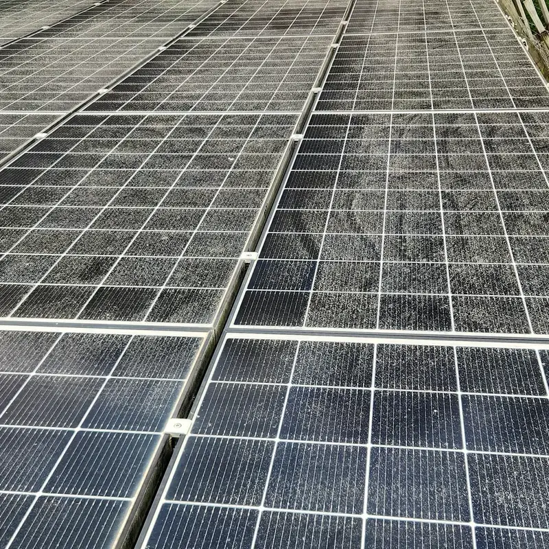 Solar panels in Bellevue before cleaning: heavy dust and grime built up across the array